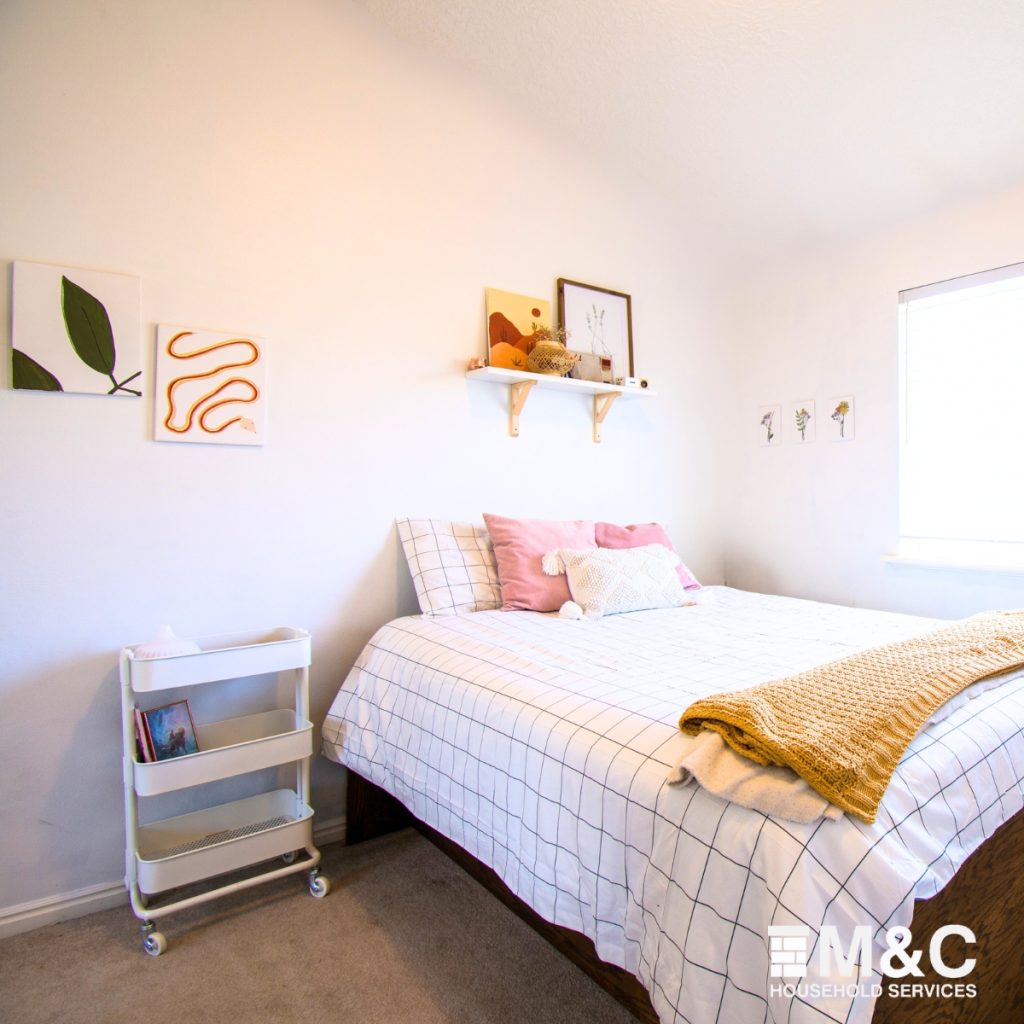 Decorated bedroom with neutral tones and clean lines in North London flat