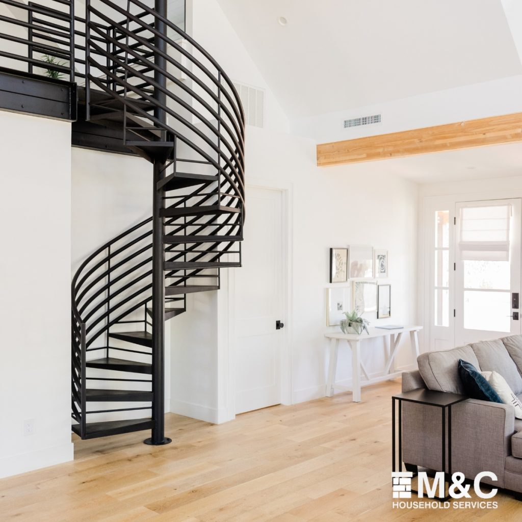 Converted barn featuring timber beams and new lighting by M&C